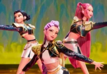 Afiche de la película de Netflix KPop Demon Hunters con los personajes principales del grupo femenino de K-Pop y el título en la parte superior.